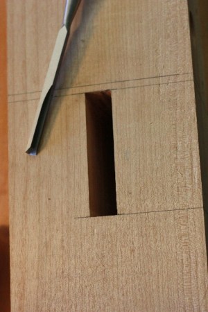 Vise through mortise leg